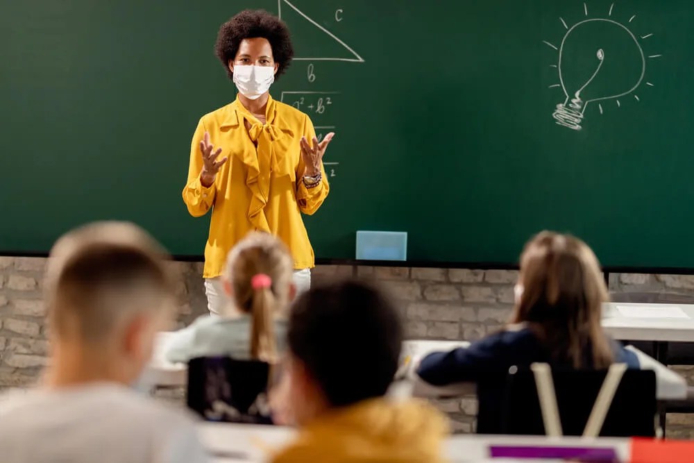 Returning to In-Person Classes Poses Risks to Latino Households