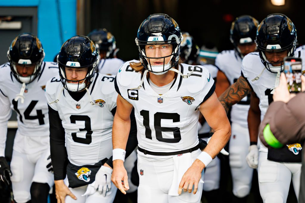 Trevor Lawrence #16 and the offense of the Jacksonville Jaguars run onto the field before the game against the Tennessee Titans in Nashville, Tennessee at Nissan Stadium on January 7, 2024 in Houston, Texas.